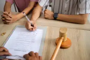 Image of court order documents being issued to a family